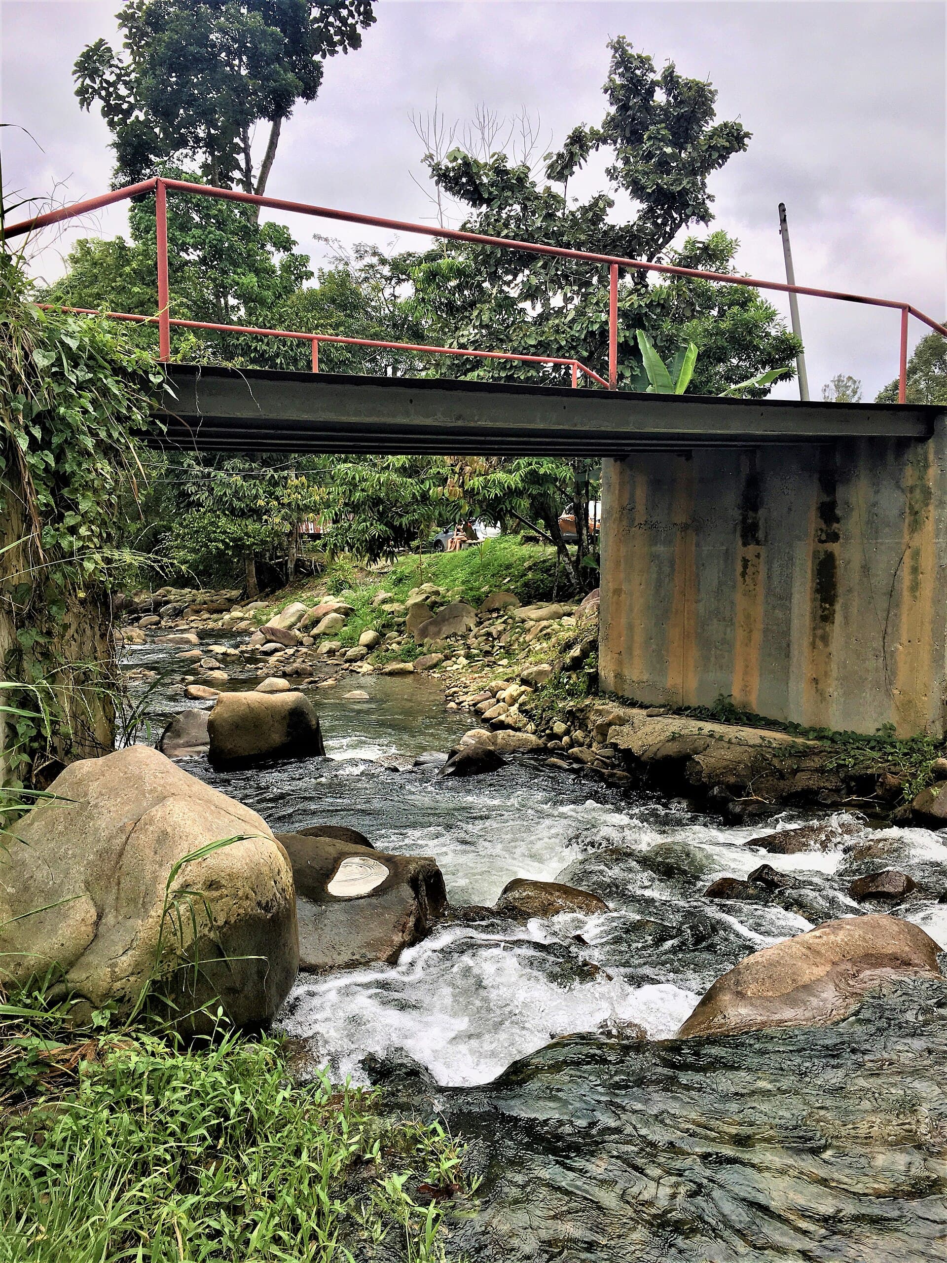 Stone bridge over the Chemperoh River in Janda Baik — gateway to the waterfall hiking trails