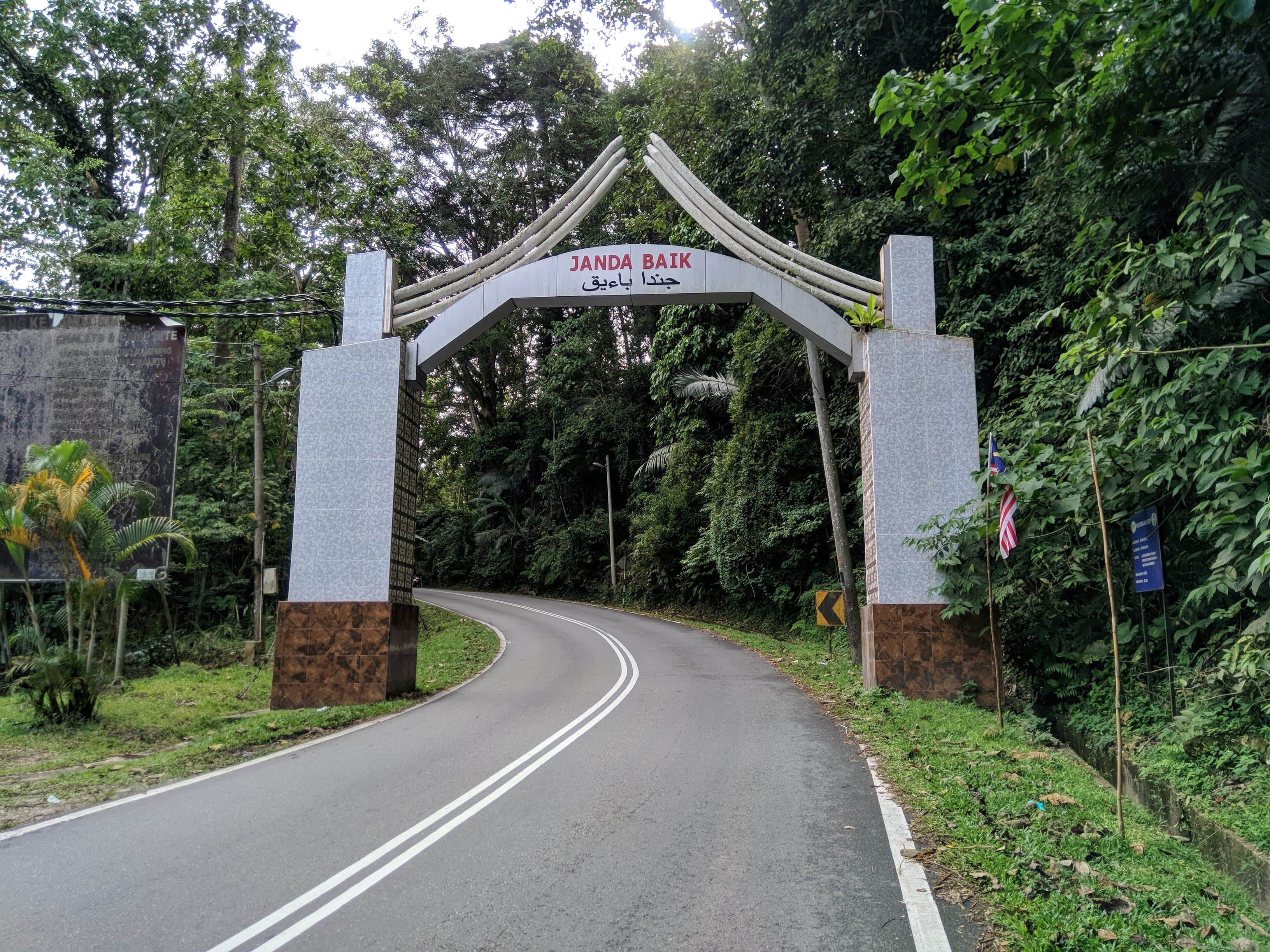 Janda Baik highland entrance — lush tropical forest gateway
